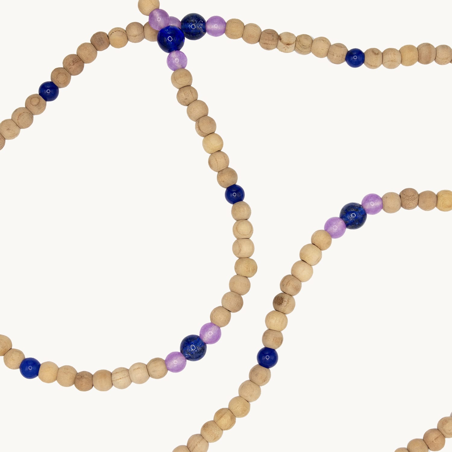 Bandoulière en perles de bois avec deux mousquetons dorés