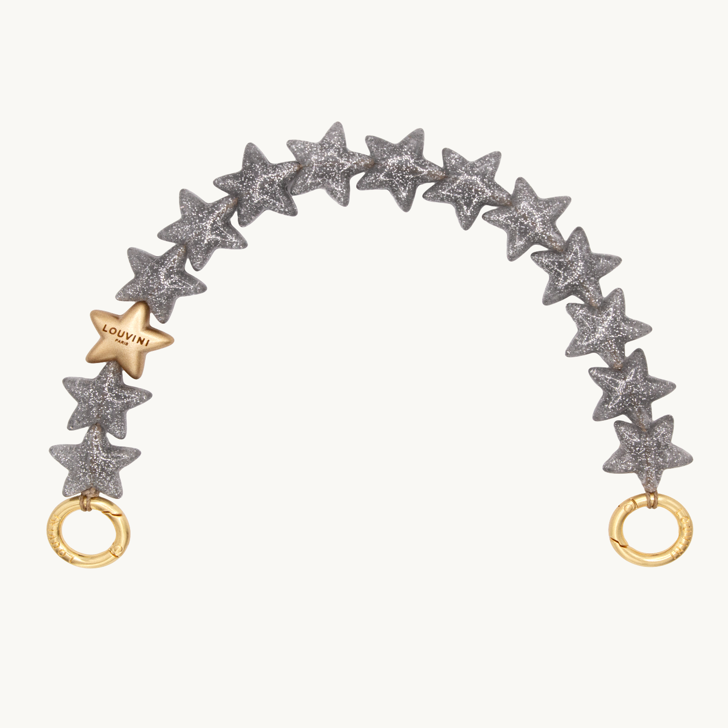 bracelet de téléphone étoiles argenté à paillettes et anneaux dorés