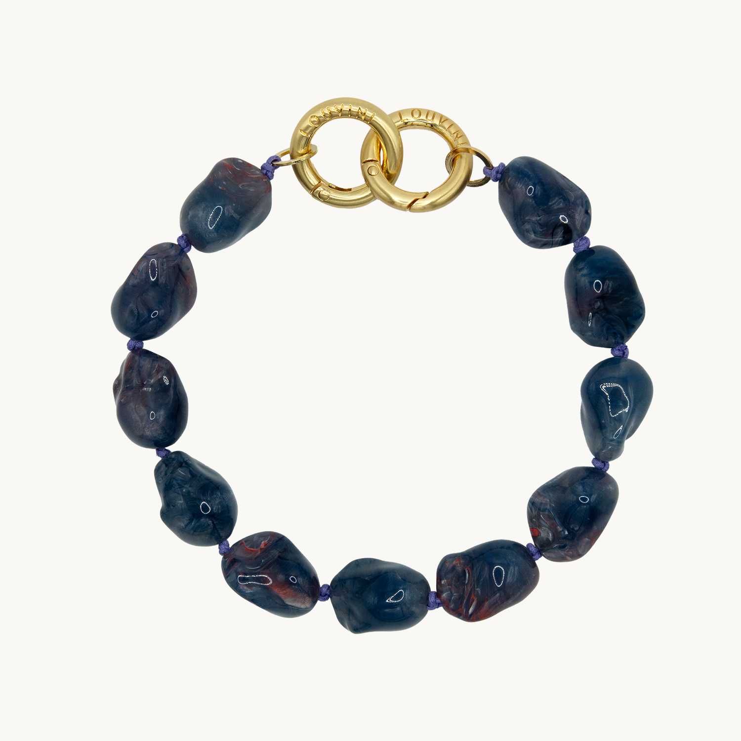 Bracelet pour téléphone avec pierres en résine et anneaux dorés
