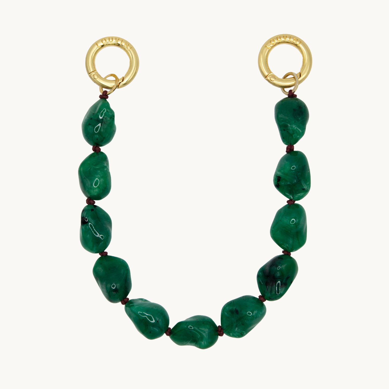Petite chaîne de telephone bracelet vert avec pierres en résine et anneaux dorés