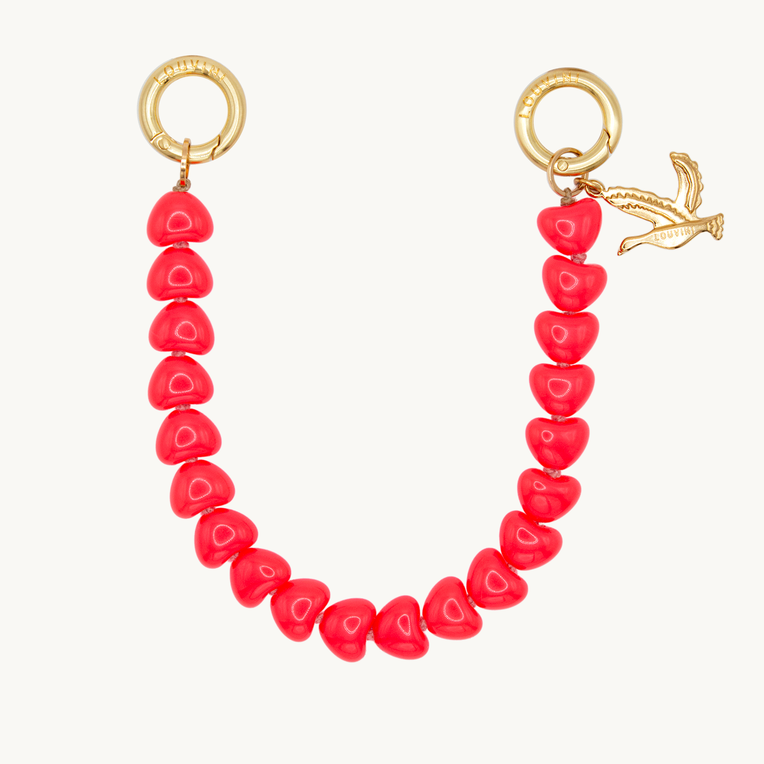 Petite chaine de telephone en coeur corail