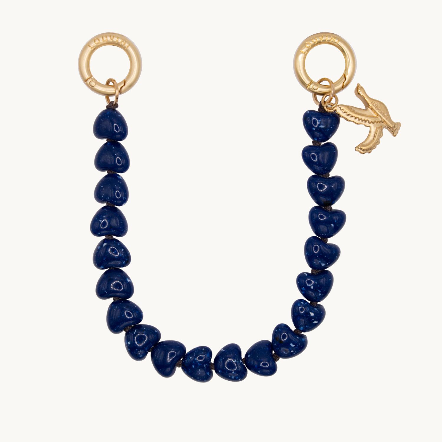 bracelet de téléphone à perles petits coeurs bleu marine et anneaux dorés