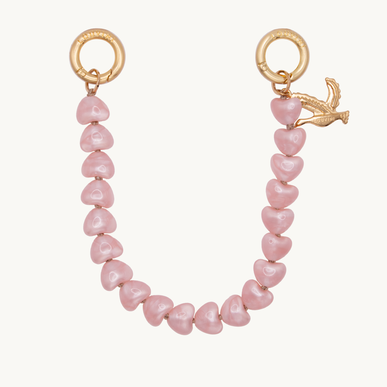 bracelet de téléphone à perles petits coeurs roses et anneaux dorés