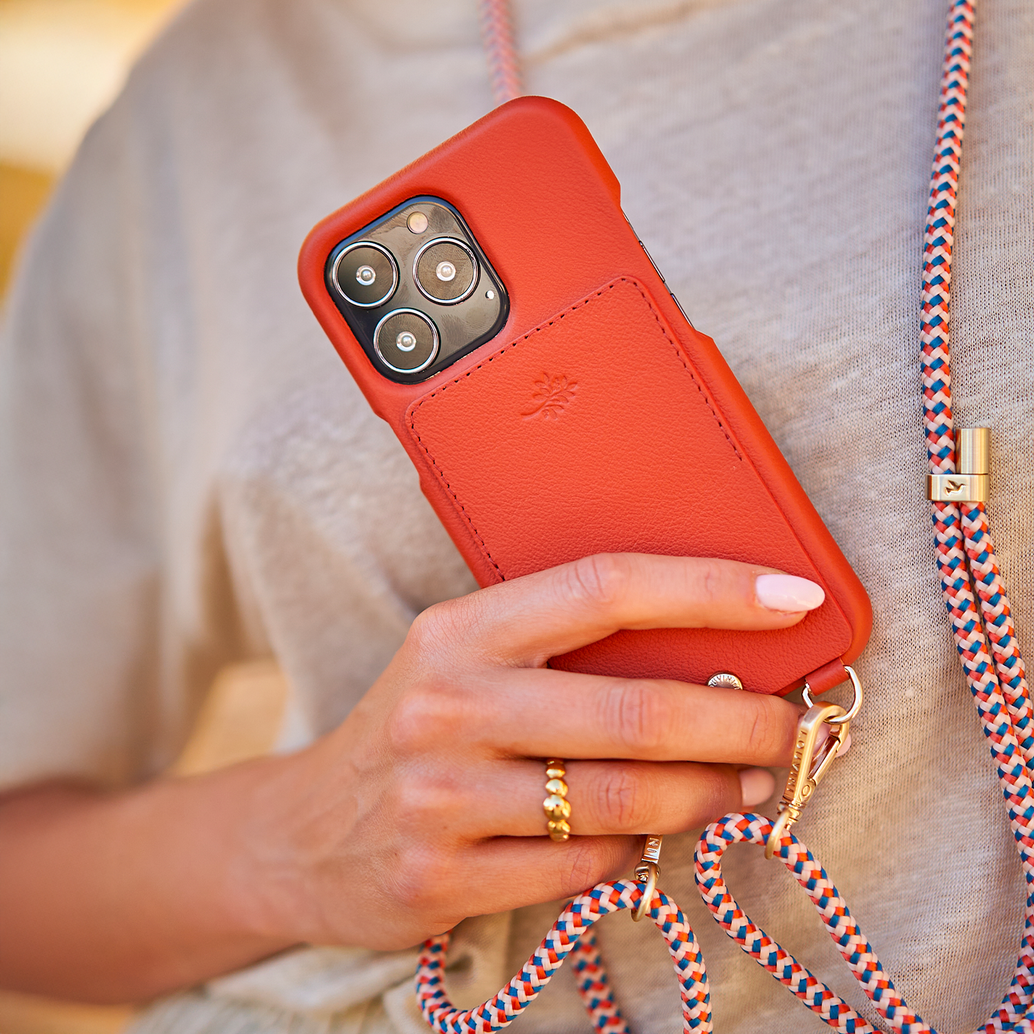 LEATHER IPHONE CASE WITH WALLET AND LOOPS LOU x AIRELLES - ORANGE