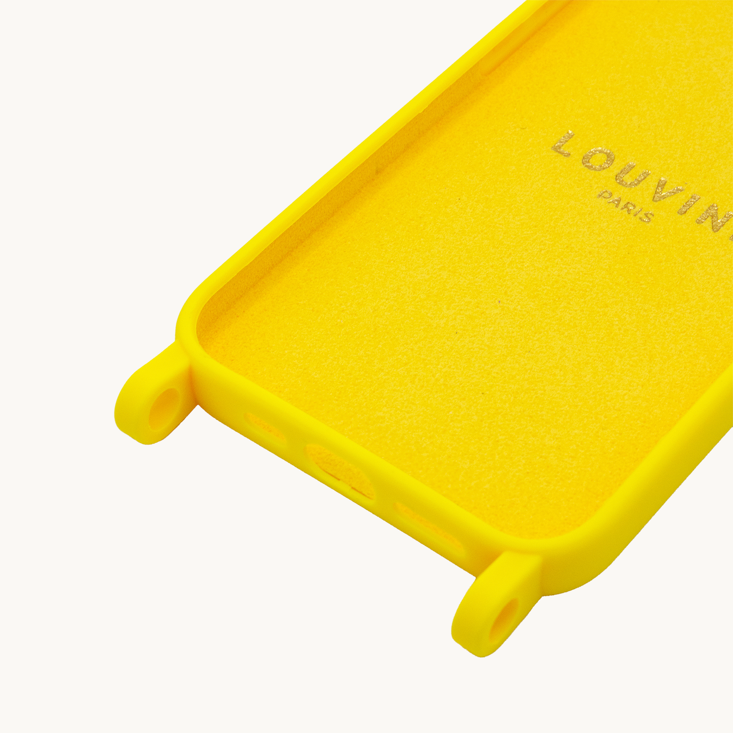 coque iPhone détail silicone jaune avec anneaux