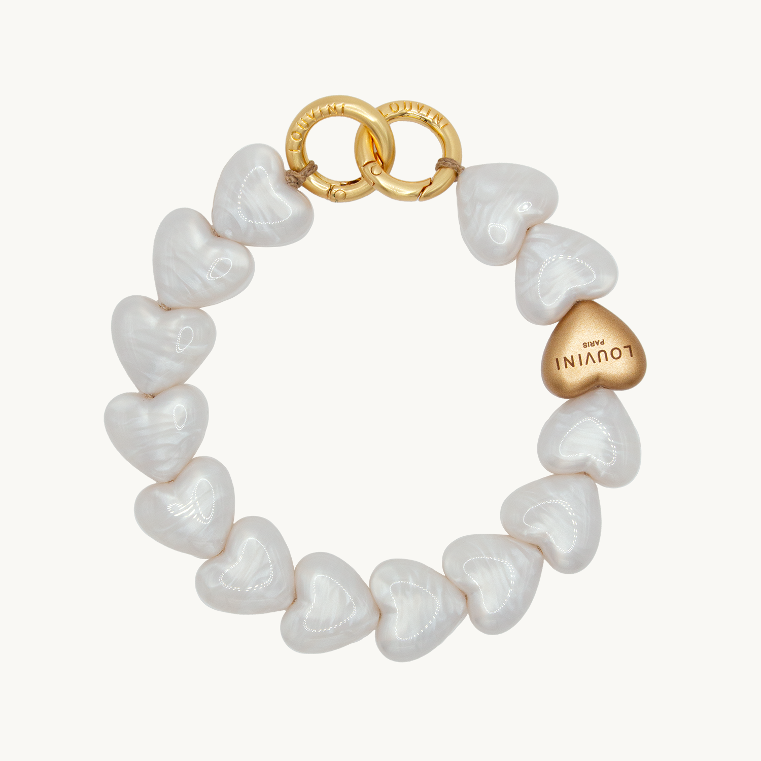 bracelet de téléphone à perles coeur blanches